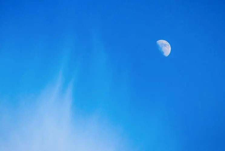 Moon visible in the daytime sky