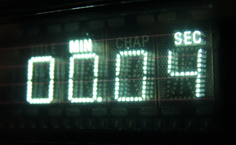 Close-up of a retro digital display showing minutes and seconds in glowing numbers