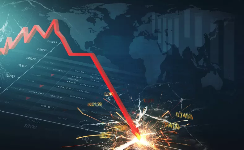 A descending red stock chart line crashing into a shower of sparks over a world map background
