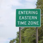 Road sign showing entering Eastern Time Zone