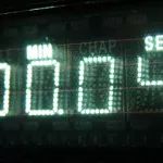 Close-up of a retro digital display showing minutes and seconds in glowing numbers